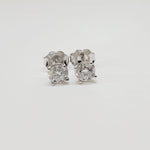 .74 Carat Round Diamond Studs